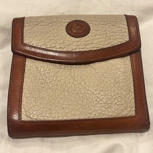 Dooney Bourke vintage wallet in good condition.